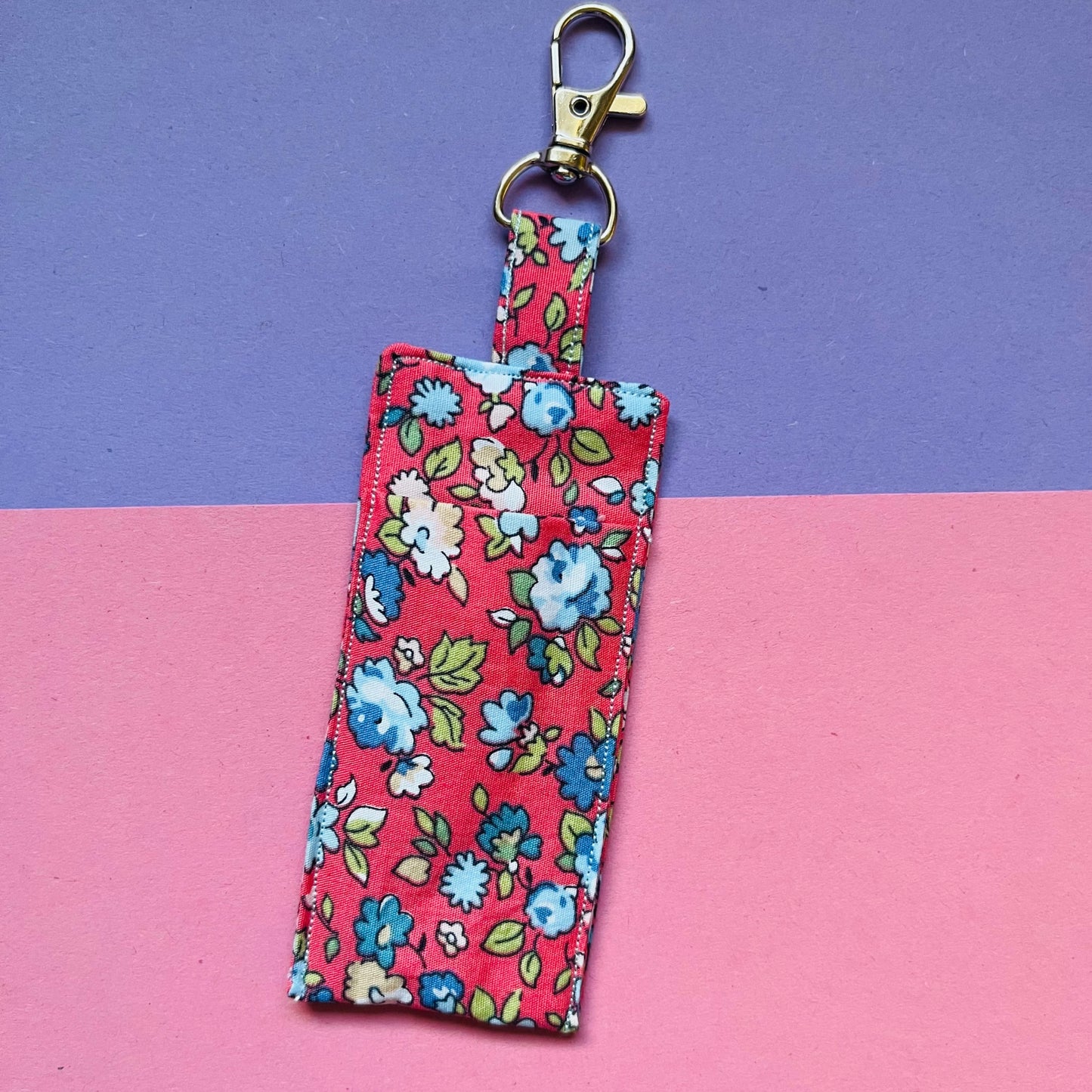 salmon coloured floral lip balm holder