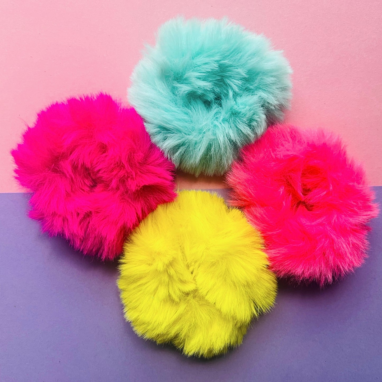 Overhead shot of neon scrunchies E for Eva