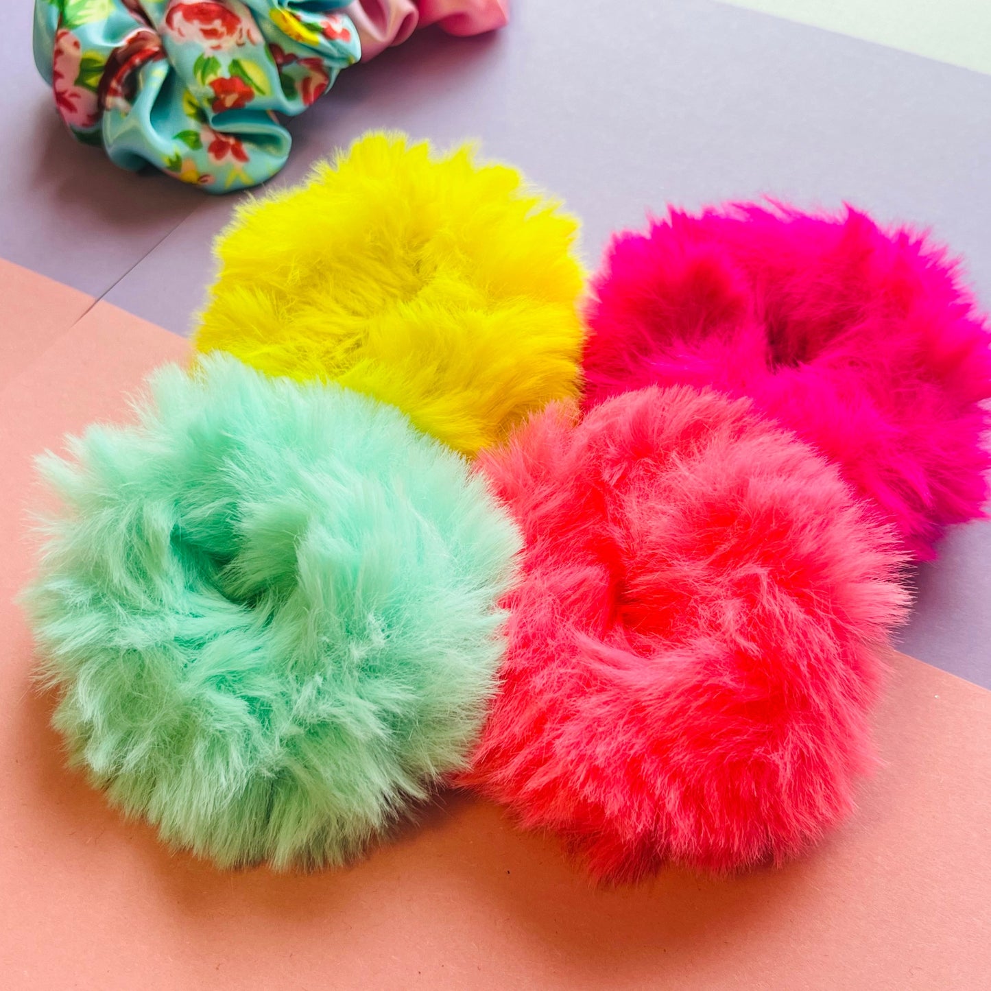 Shot of all neon fur scrunchies