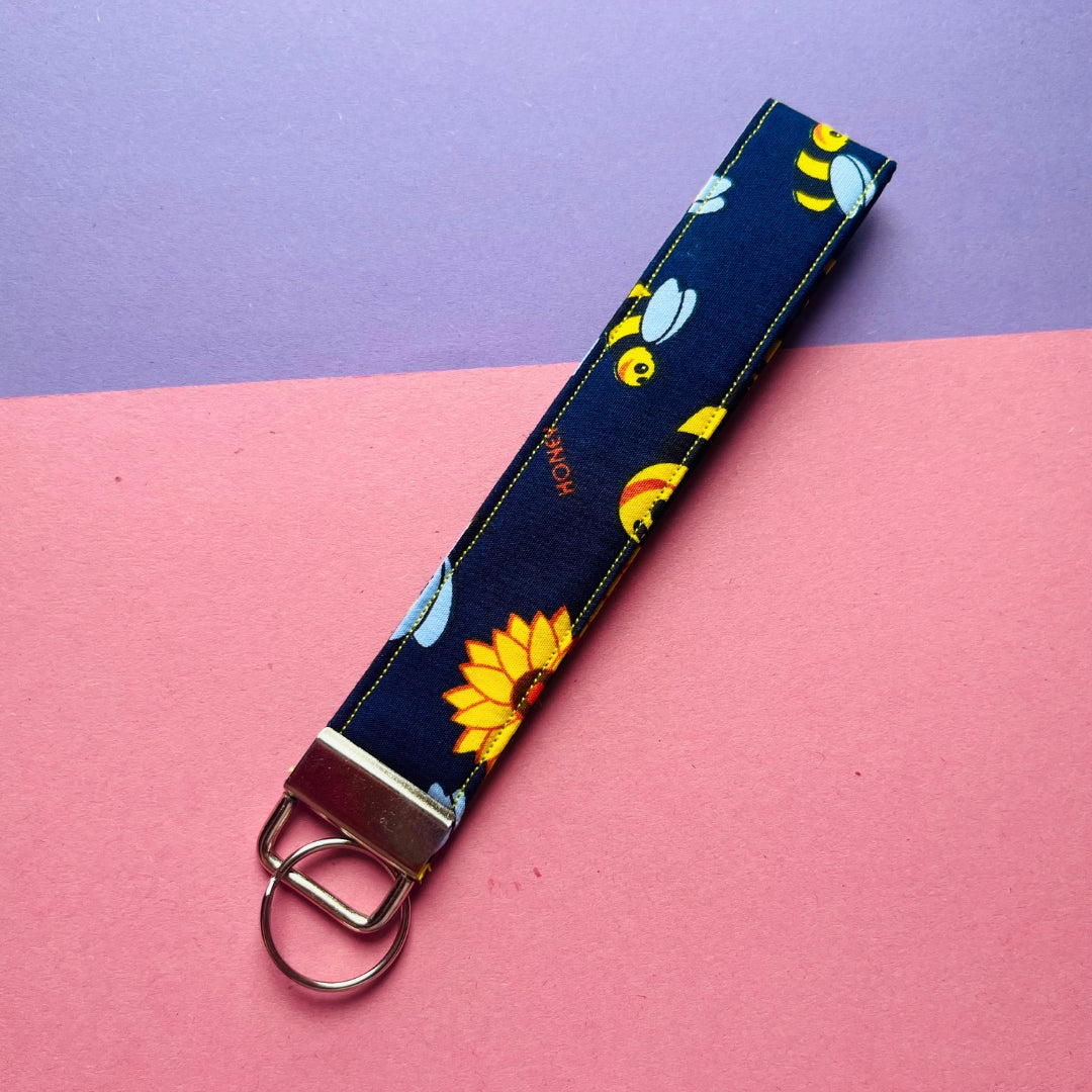 Matching bumblebee print purse and wristlet key fob set