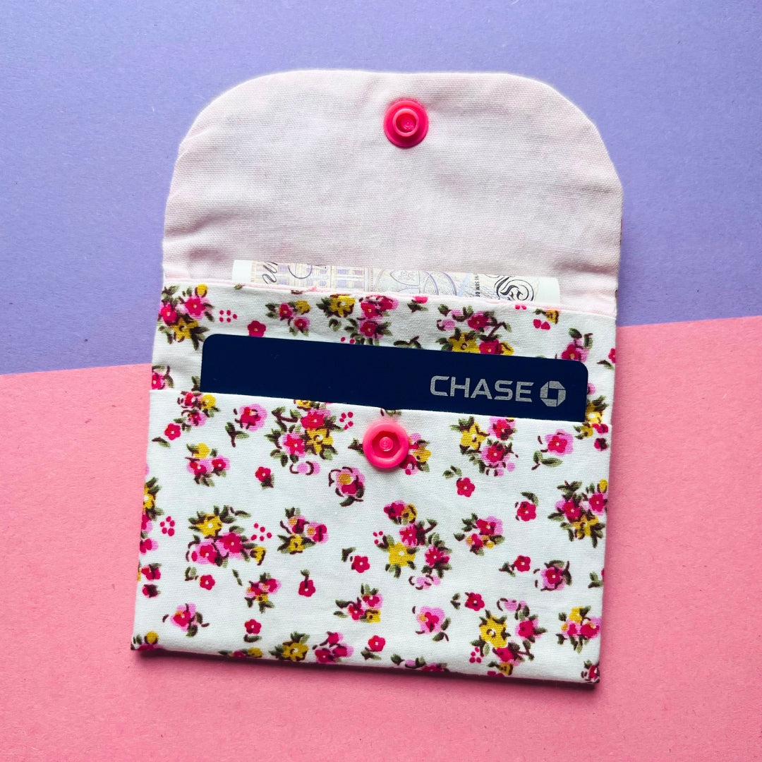 matching pink floral print purse and key fob wristlet