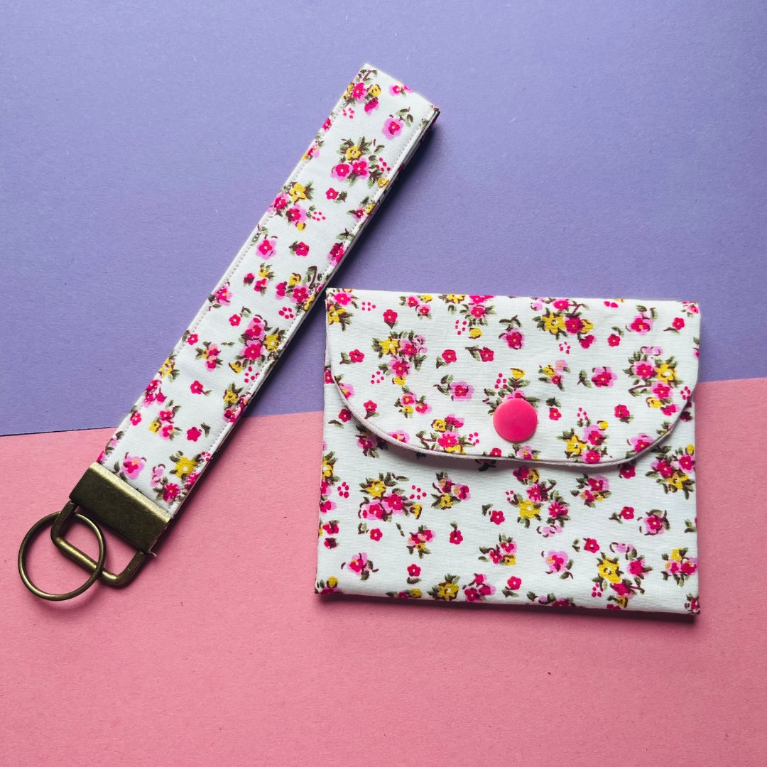 matching pink floral print purse and key fob wristlet