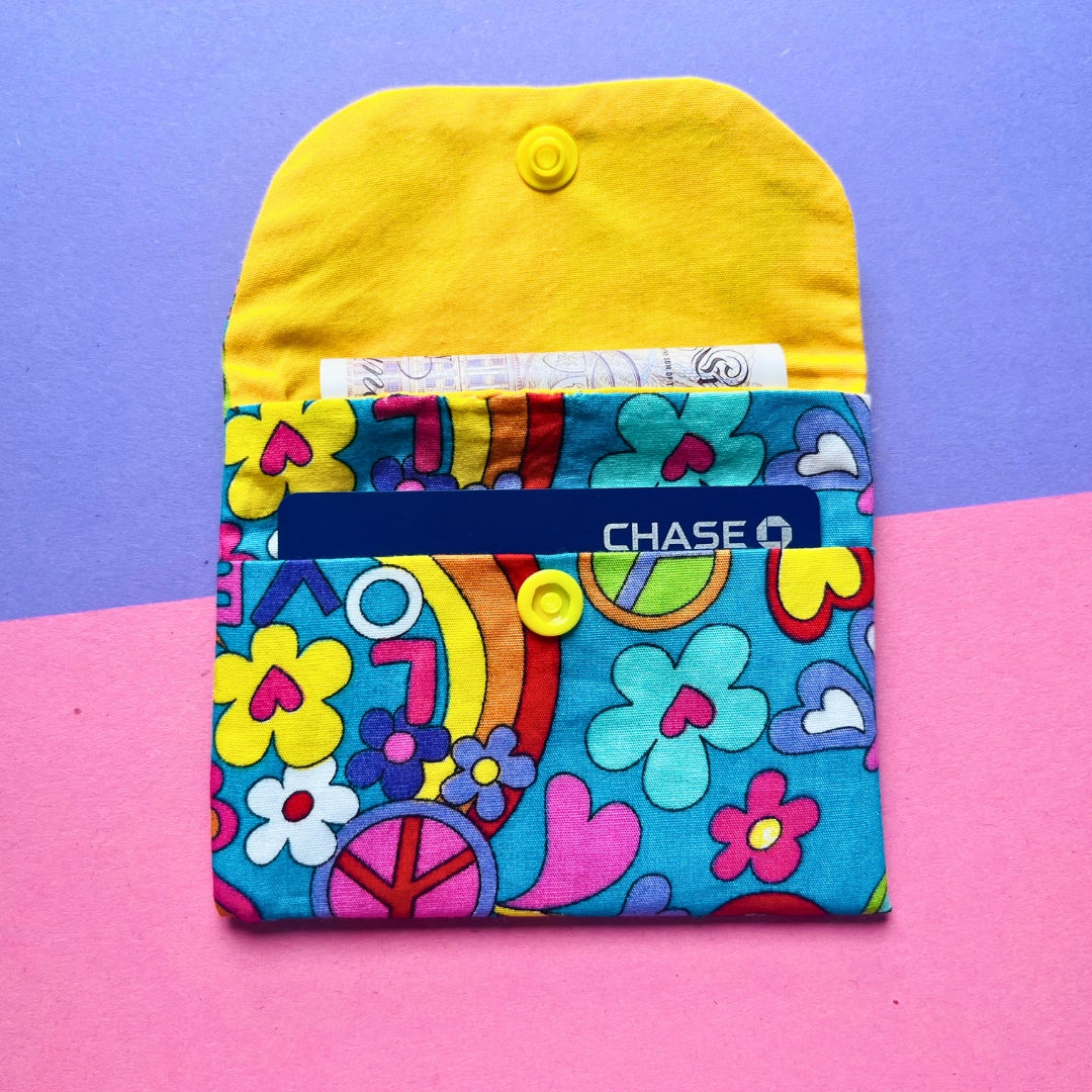 Funky 60s inspired purse and key fob wristlet gift set in use