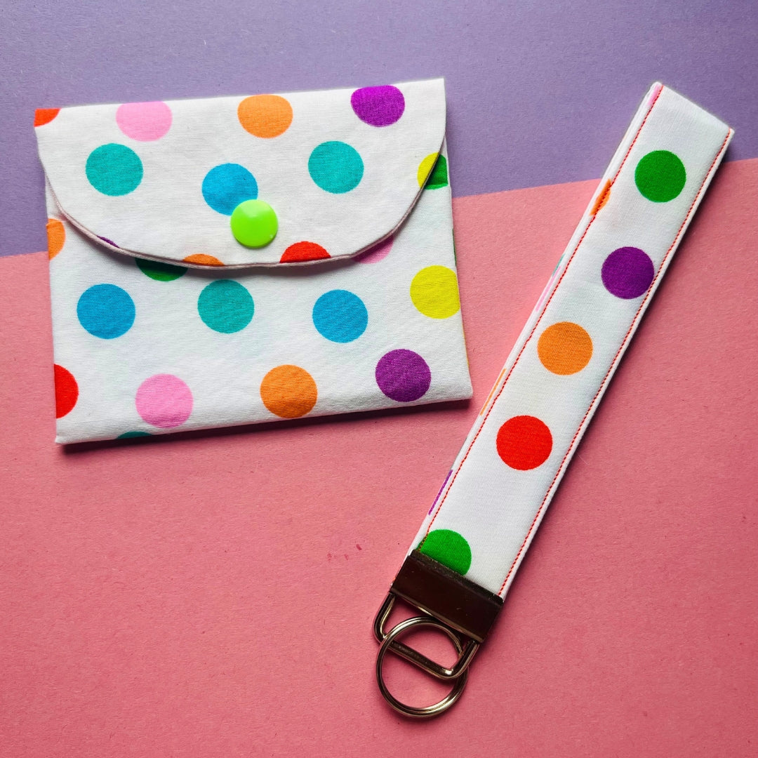 Matching multicoloured spot print purse and key fob wristlet
