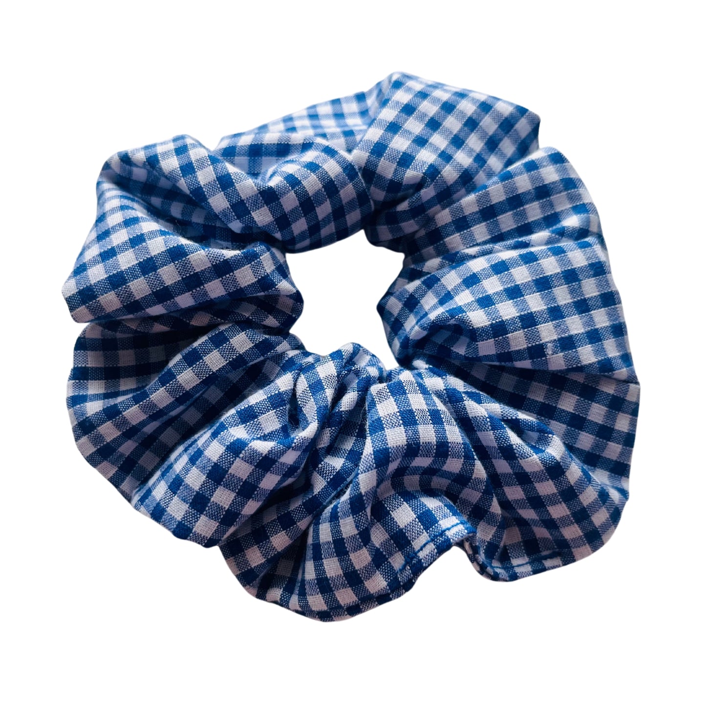 Angled view of blue gingham school hair scrunchie E for Eva