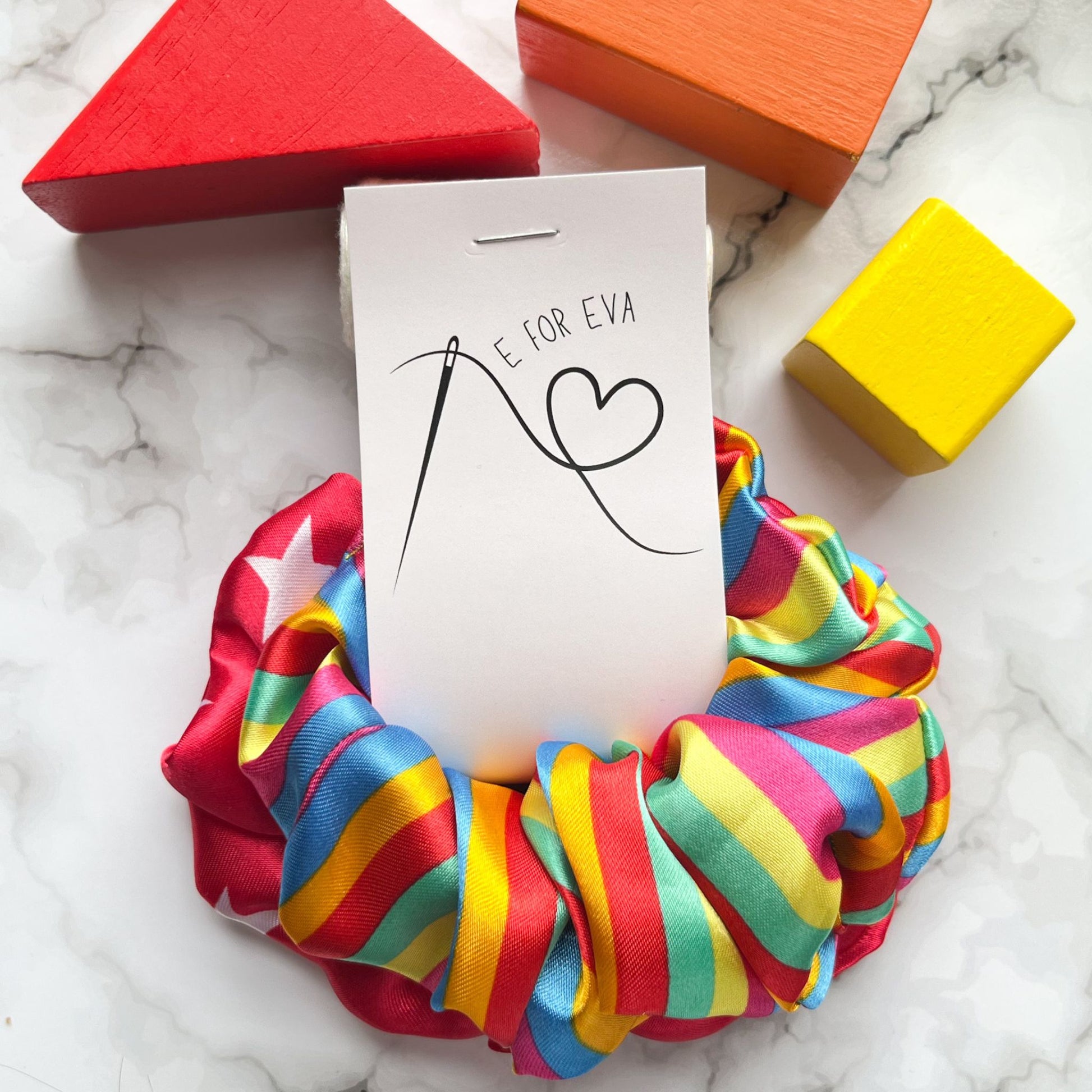 Styled tagged view of circus stripes stars rainbow hair scrunchies satin E for Eva