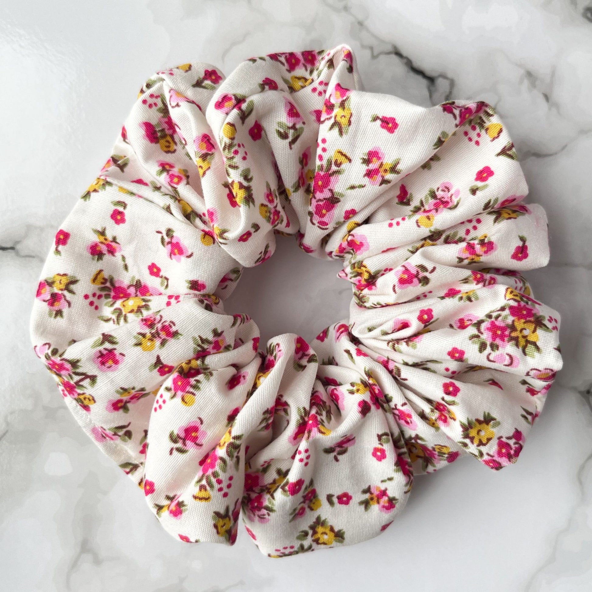 Close up of floral pink hair scrunchie cotton E for Eva