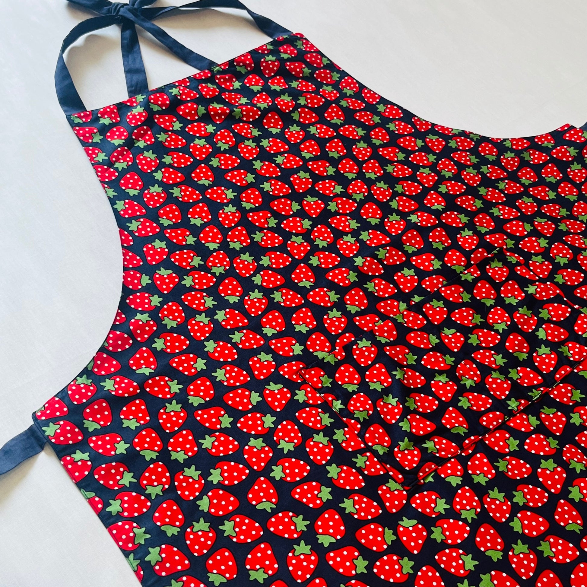 Close up of adult strawberry apron