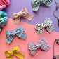 Overview of polka dot bow hair clips E for Eva