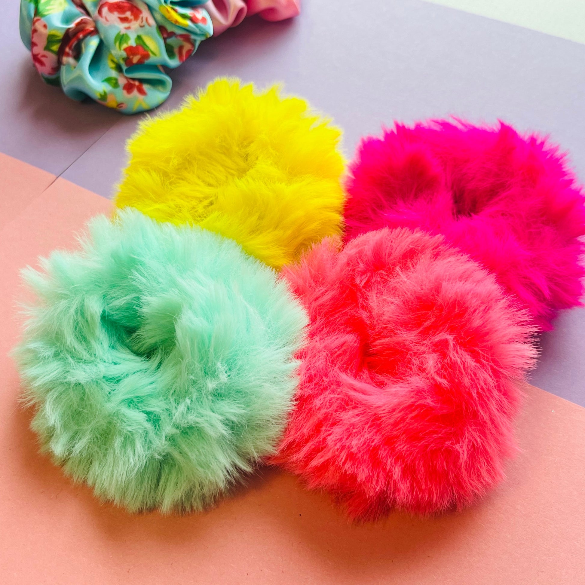Shot of all neon fur scrunchies