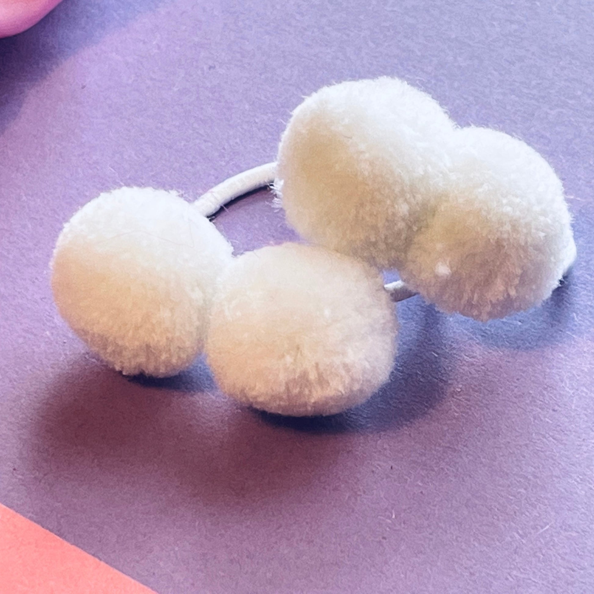 White pompom hair ties E for Eva