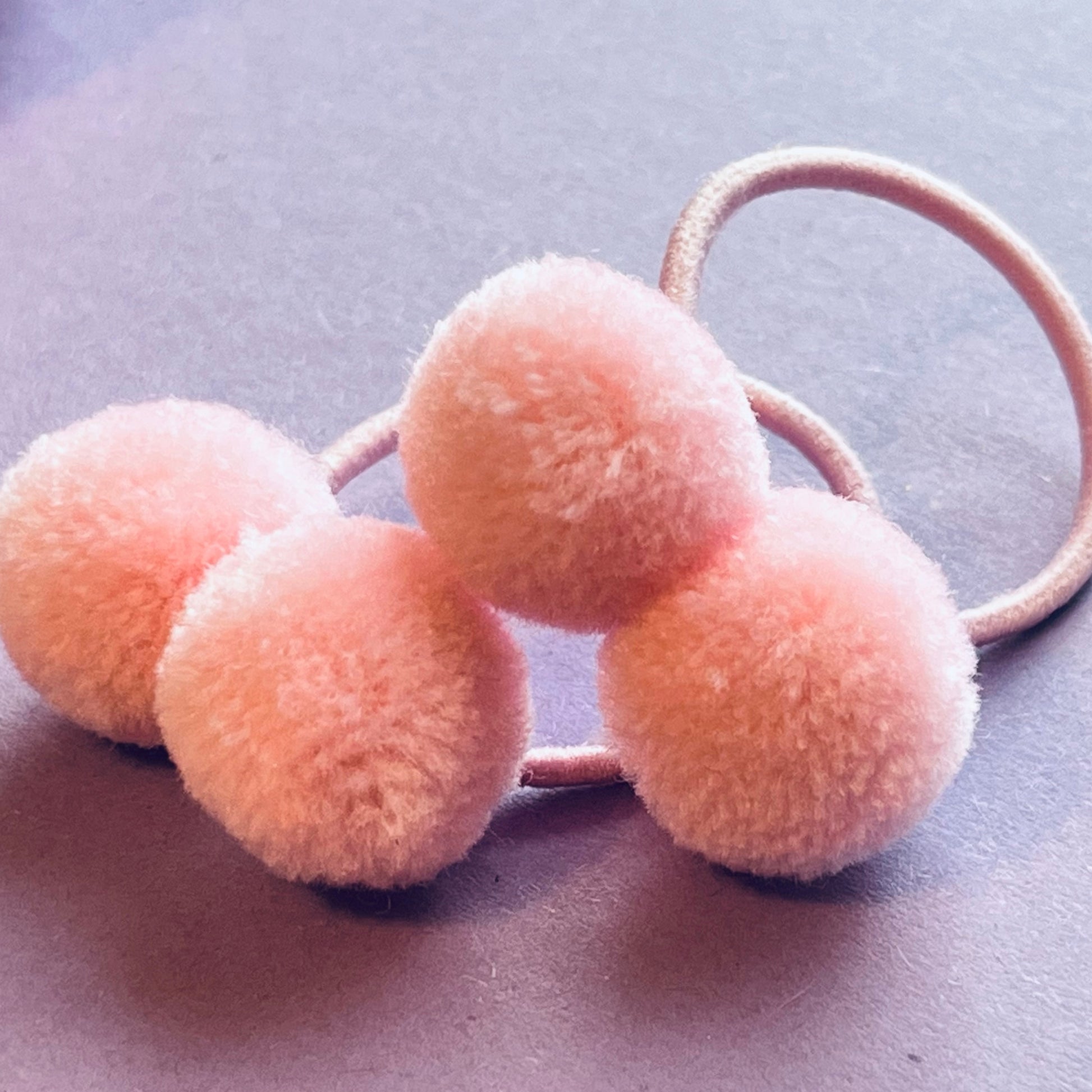 Pink pompom hair ties E for Eva
