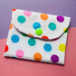 Matching multicoloured spot print purse and key fob wristlet