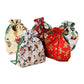 View of Christmas drawstring gift bags E for Eva