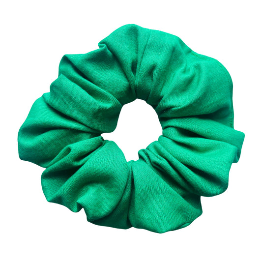 Close up of green cotton school hair scrunchie E for Eva