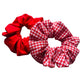 Shot of red cotton school hair scrunchies E for Eva