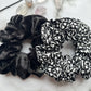 Styled overview of black and white floral hair scrunchies velvet cotton E for Eva