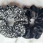 Overview of black and white floral hair scrunchies cotton velvet E for Eva