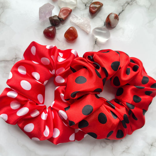 Styled overview of red black and white spots hair scrunchies satin E for Eva